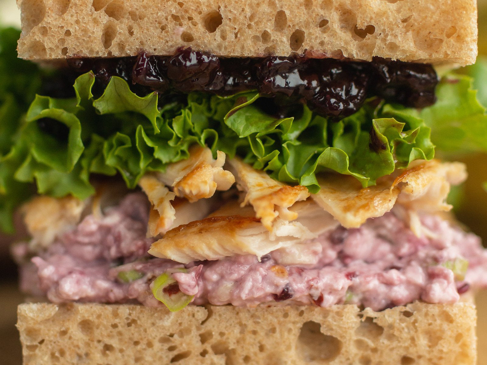 A thick sandwich with cream cheese mixed with Oregon Growers' jam, thinly sliced scallions, and special seasonings.