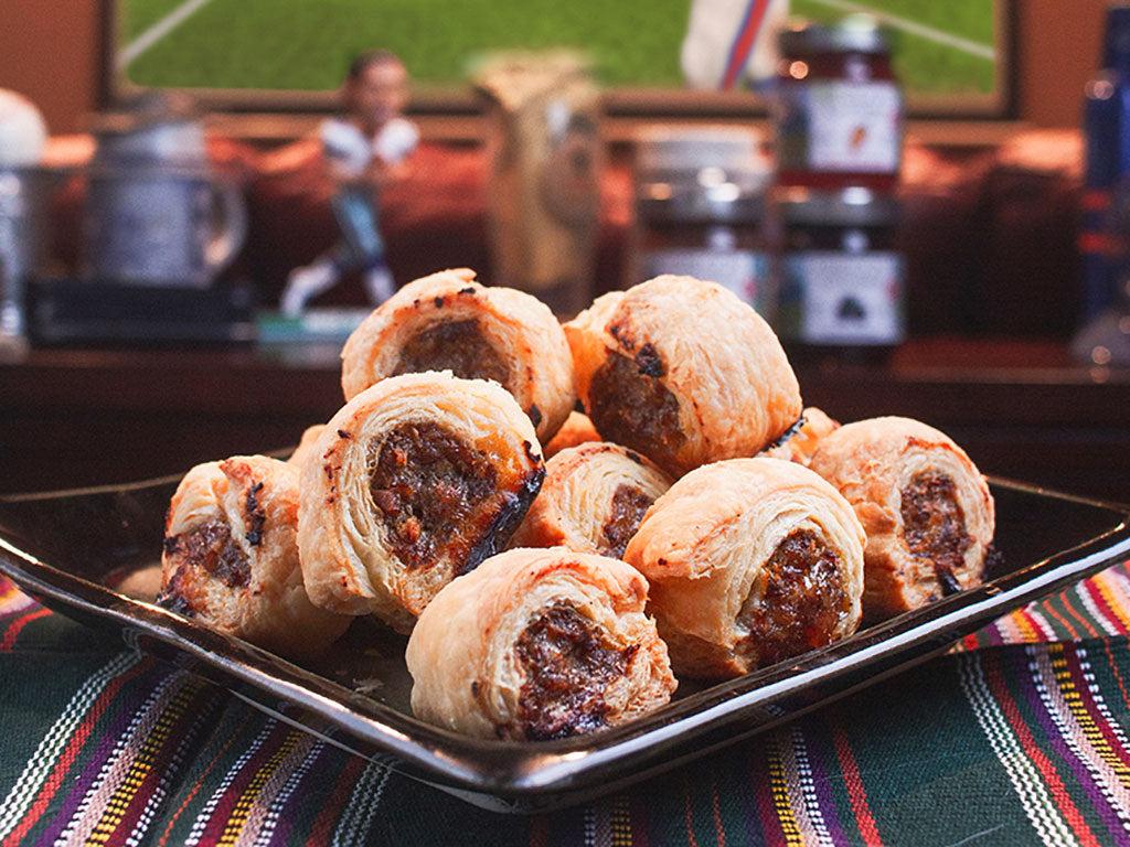 Sausage Rolls served on a platter prepared with a recipe including Pear & Hazelnut Jam from Oregon Growers, seasoning, and pork.