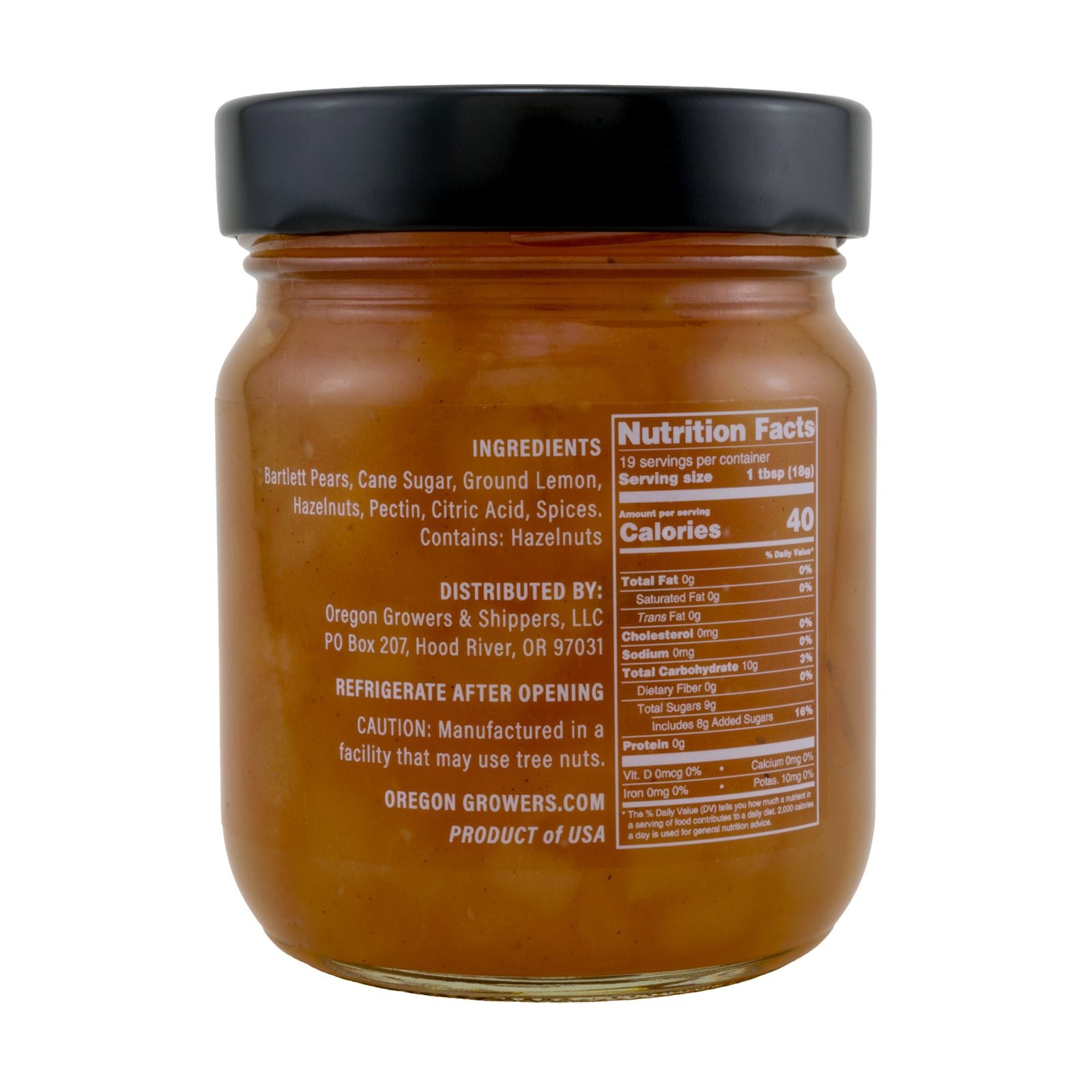 Close-up right side view of Oregon Growers Pear Hazelnut Fruit Pate jar, highlighting a label with ingredients, nutritional facts, and product details. The 12 oz (340 g) jar is topped with a black lid.