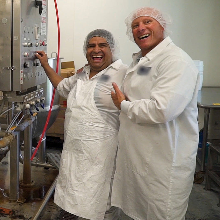 The company's owner, Dave Gee, posing with a production chef at one of our facilities.
