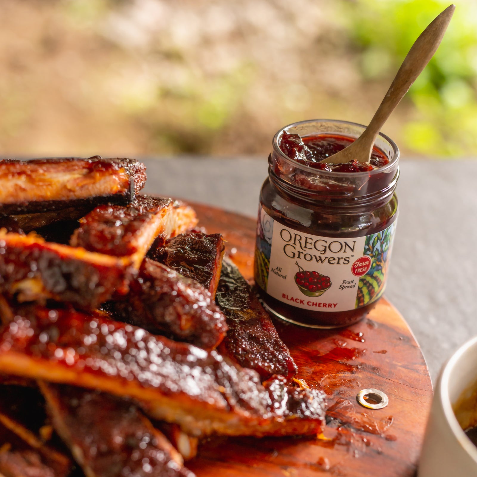 Platter of ribs coated with our Oregon Growers Black Cherry Jam.