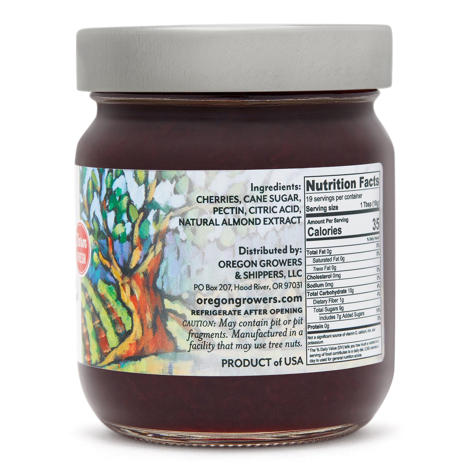 Close-up right side view of the Oregon Growers Black Cherry Jam 12 oz. glass jar, highlighting a label with ingredients, nutritional facts, and product details.