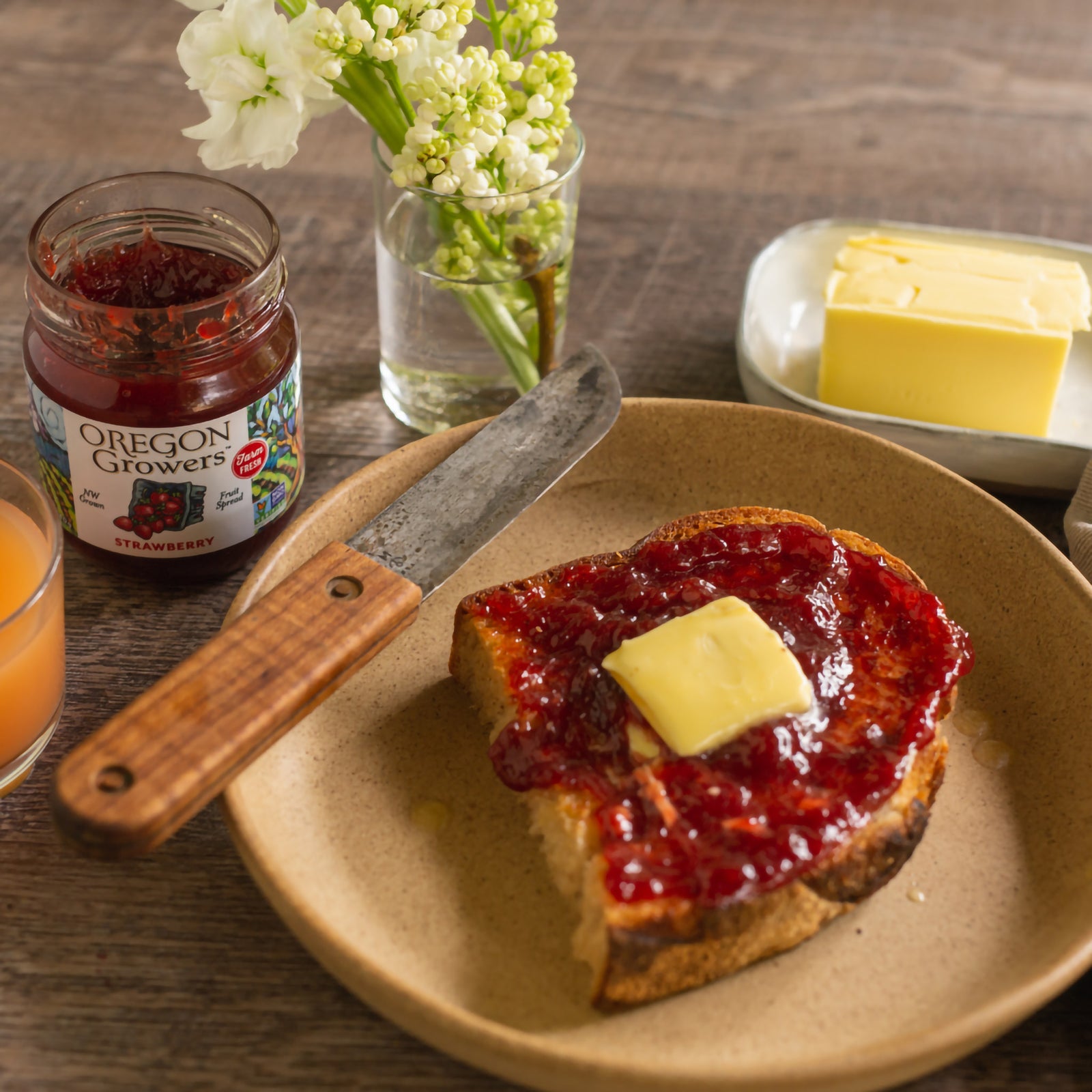 Toast on a breakfast plate, covered with our Oregon Growers Strawberry Jam.