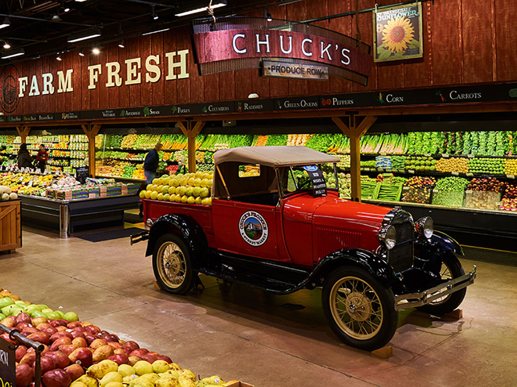 The interior view of Chuck’s Produce & Market, with fresh and natural foods on the shelves from regional products and farms.