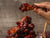 Stack of juicy chicken wings coated with a special recipe sauce including Oregon Growers Marionberry Habanero Jam.
