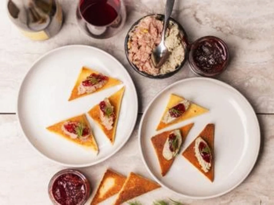 Top view of Country Pork Pate served on a plate and Topped with Strawberry Rhubarb Jam by Oregon Growers.