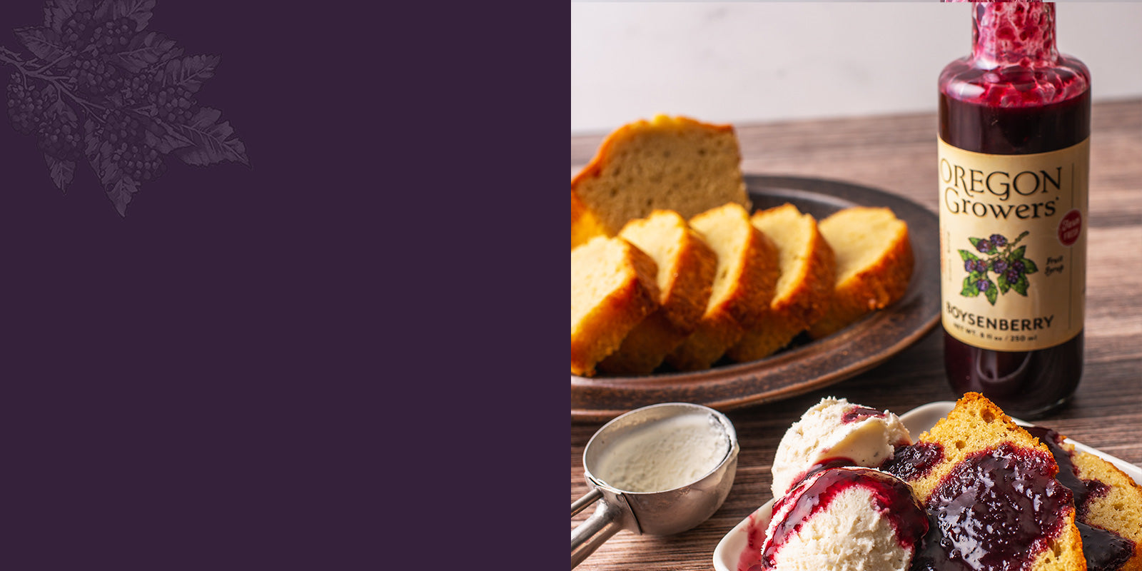 A breakfast table setting with a jar of Oregon Growers Boysenberry Fruit Syrup in the background and drizzled syrup on bread in the front. 