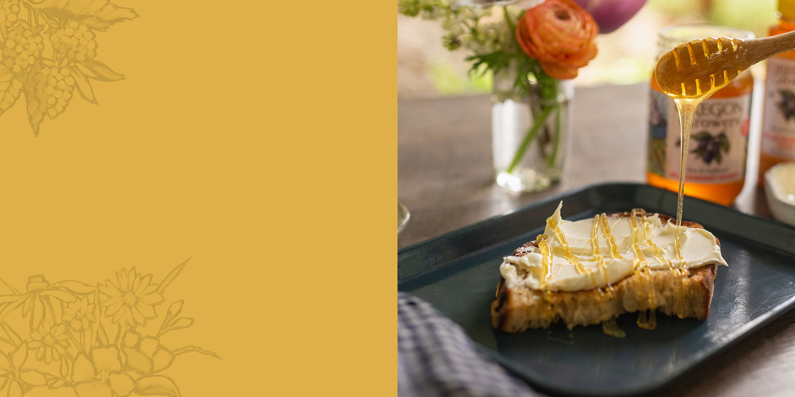 A breakfast table setting with a jar of Oregon Growers Honey in the background and Honey dripping from a wooden spoon onto morning toast in front.