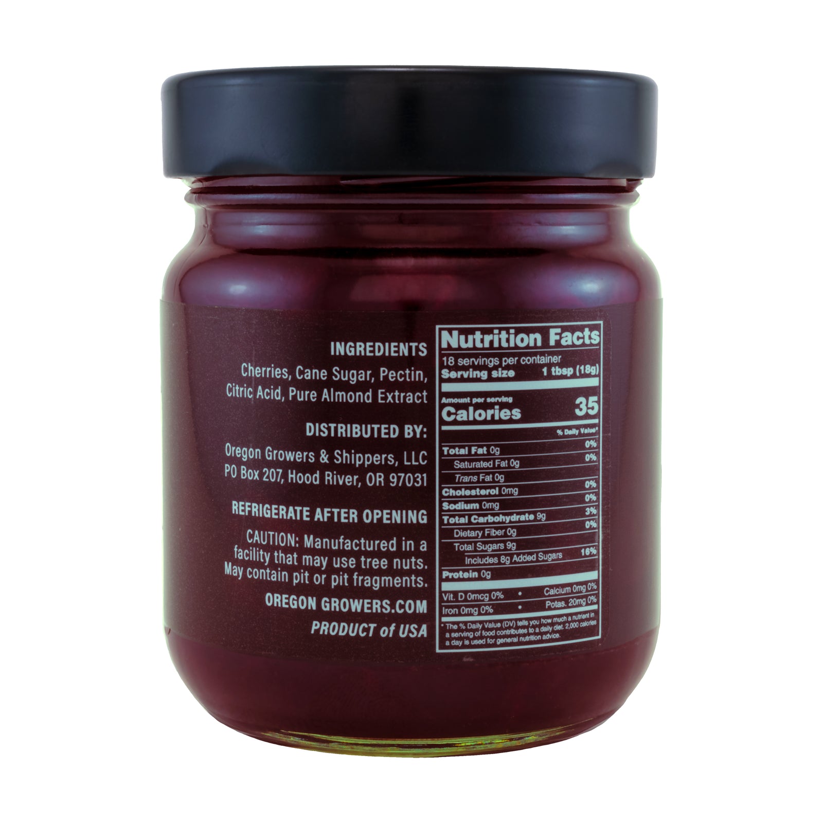Close-up right side view of Oregon Growers Sour Cherry Fruit Pate jar, highlighting a label with ingredients, nutritional facts, and product details. The 12 oz (340 g) jar is topped with a black lid.
