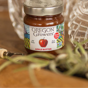 Close-up of our 12 oz. Apple Butter jar on a table.