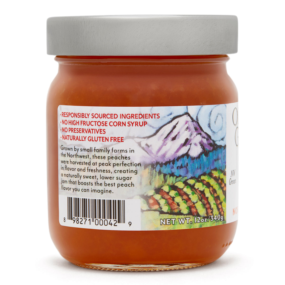 Close-up left side view of the Oregon Growers Orchard Peach Jam 12 oz. glass jar.
