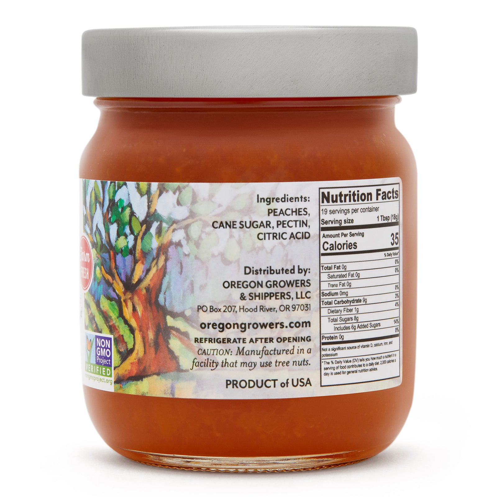 Close-up right side view of the Oregon Growers Orchard Peach Jam 12 oz. glass jar, highlighting a label with ingredients, nutritional facts, and product details. 