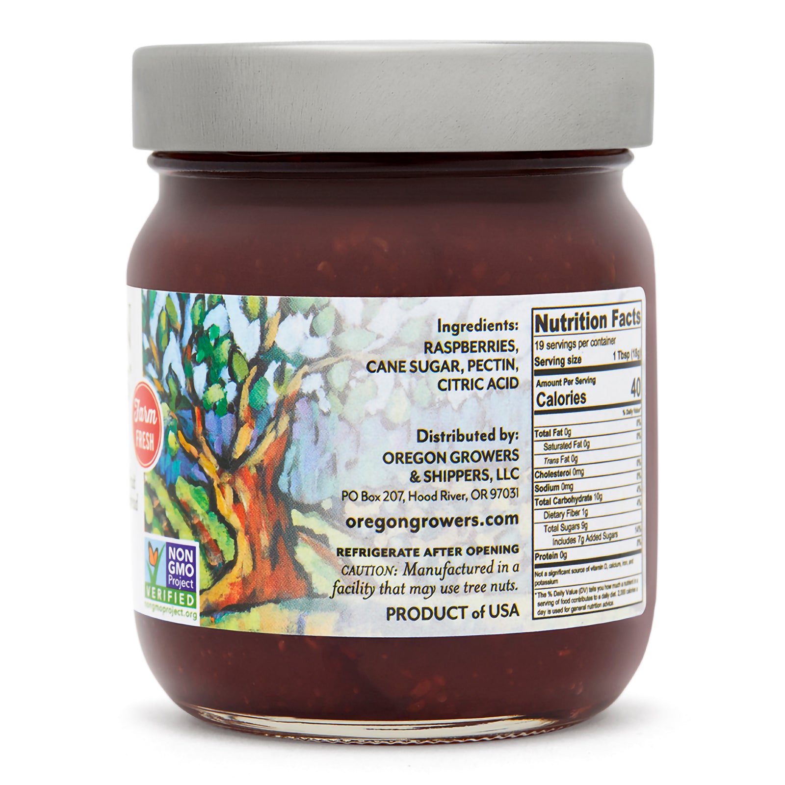 Close-up view (right side) of the Oregon Growers Red Raspberry Jam in the 12 oz. jar, showcasing the label with ingredients, nutritional facts, and product details. 