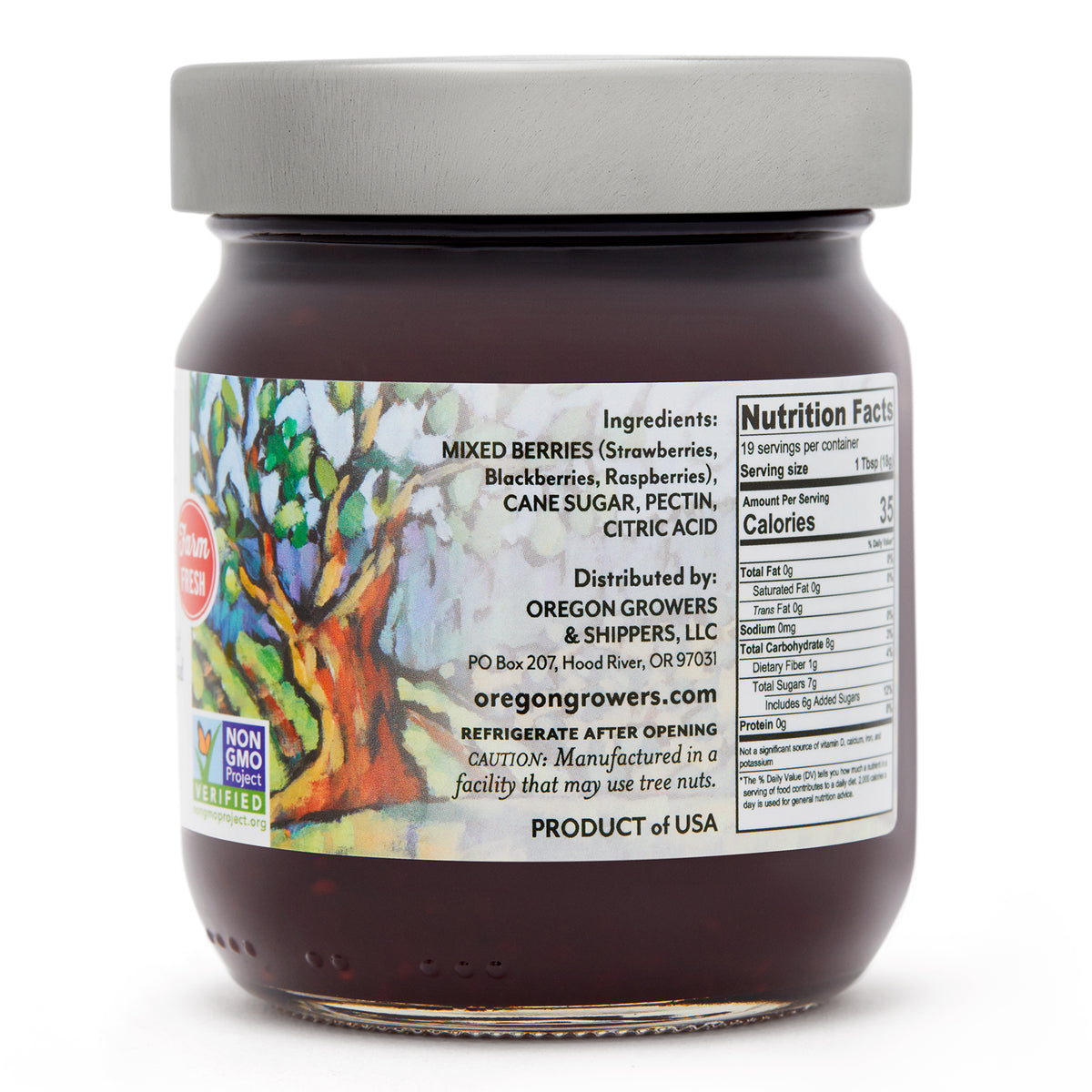Close-up view (right side) of our  Oregon Growers Triple Berry Jam in the 12 oz. jar, highlighting a label with ingredients, nutritional facts, and product details.