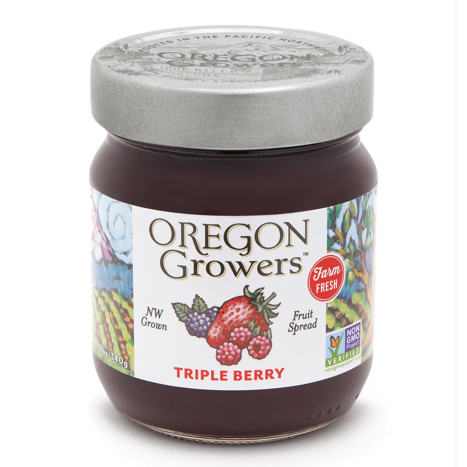 Close-up view (front side) of our Oregon Growers Triple Berry Jam in the 12 oz. jar with the colorful label and 'FARM FRESH' badge.